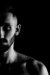 Black and white portrait. Man with long beard. Hipster profile portrait. Serious man silhouette. Open eyes. Looking forward.