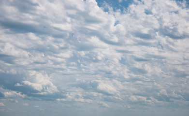 Sky and clouds during the daytime in the summer.