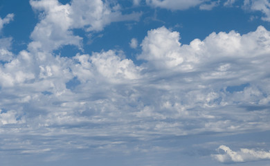 Sky and clouds during the daytime in the summer.