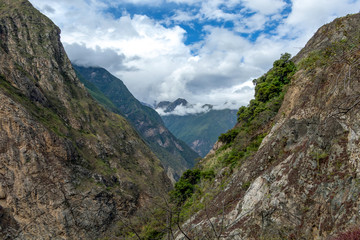 The Apurimac river valley: Green steep slopes of deep canyon with lush vegetation, the Choquequirao trek, Peru