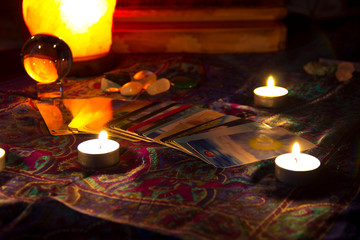 Tarot deck on a table with lights