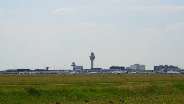Planes departing and arriving at schiphol Airport