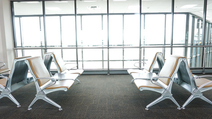 rows of empty seat at the airport
