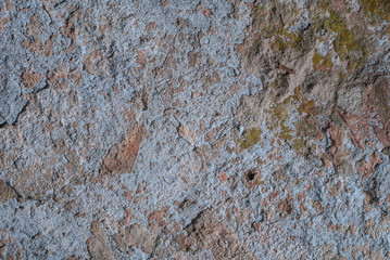 old chipped plaster on the concrete wall, chipped paint, texture, background
