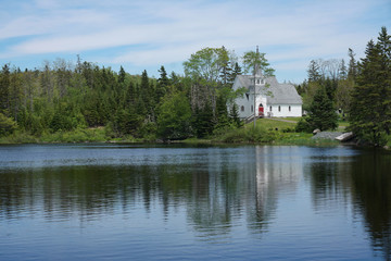 Fototapeta premium Church in the woods by a lake in Nova Scotia, Canada