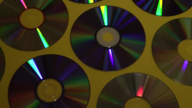 Vintage CD or DVD disk background, old circle discs used for data storage, share movies and music