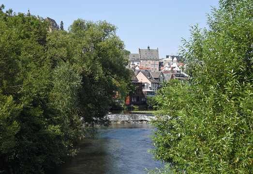 View across the river Lahn with its weir to Marburg, Hessen, Germany