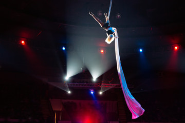 Girl's aerial acrobatics in the Circus.