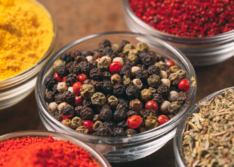 The Different Spices. Spices on stone background.