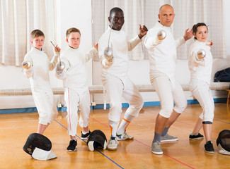 Portrait of nice mixed age group of athletes