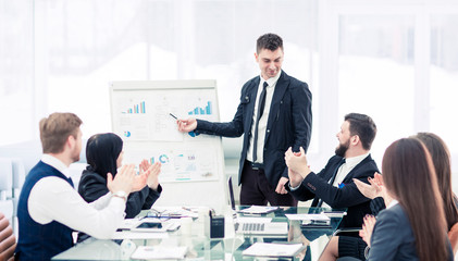 business team gives a presentation of a new financial project for the business partners of the company