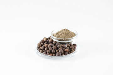 Ground Black Pepper Isolated in white.