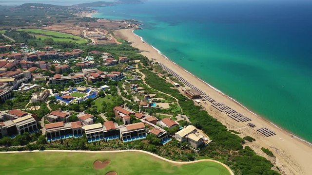 Aerial drone panoramic video of famous sandy deep turquoise - blue exotic beach of Navarino in Messinia, Peloponnese, Greece