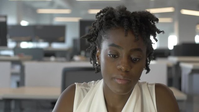 Young African American Female Entrepreneur in Coworking Space