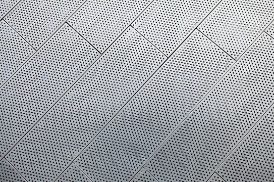 Metal shiny background. Facade of modern building