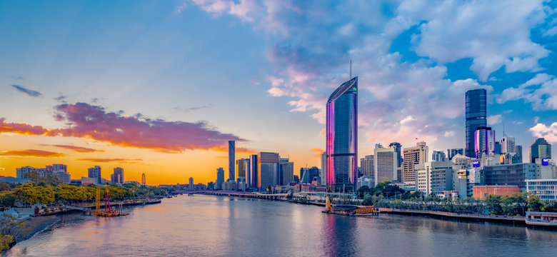 Beautiful sunset evening afternoon panorama overlooking South Bank Parklands, The Brisbane River, and Brisbane's City Skyline during winter