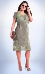 elegant woman model in summer dress and sunglasses.