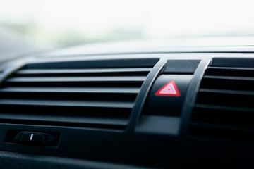 Car Emergency Light Button Pressing the Red Triangular Car Hazard Warning Button