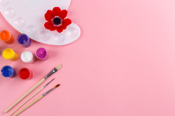 Watercolor palette and brushes