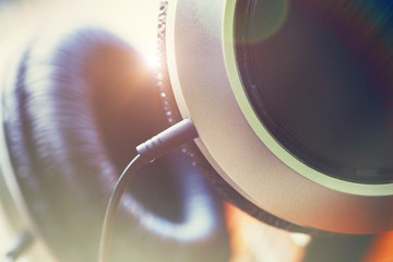 headphones for listening to music, sunny background