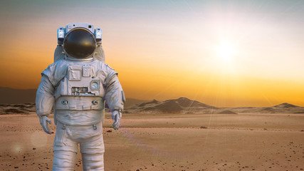 astronaut on planet Mars, walking through a desert landscape