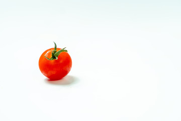 Fresh cherry tomatoes isolated on white background.	