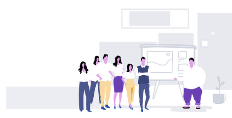 fat overweight man speaker presenting financial report on flip chart businesspeople group training conference meeting presentation concept office interior sketch full length horizontal