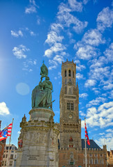 Fototapeta premium The Jan Breydel and Pieter de Coninck statue located in the historical city center and Market Square (Markt) in Bruges (Brugge), Belgium on a sunny day.