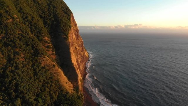 Waimanu Valley, aerial of the west wall and  sea cliff at sunrise
