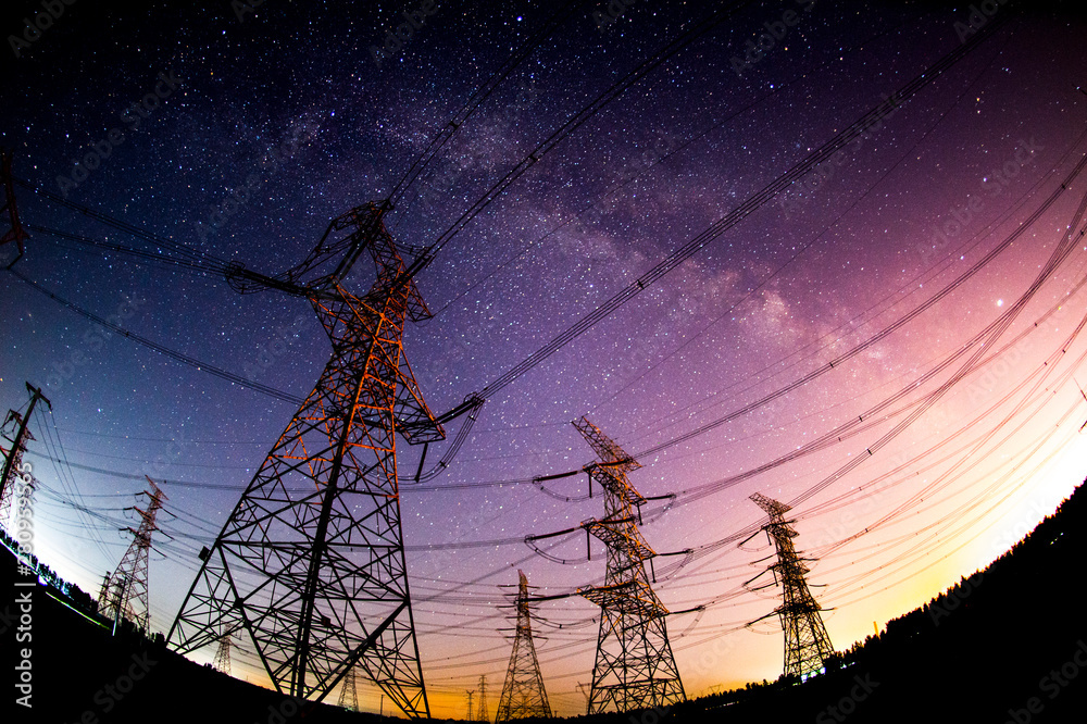 Wall mural The outline of the power supply facilities and stars at night