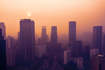 Silhouette of skyscrapers with air pollution