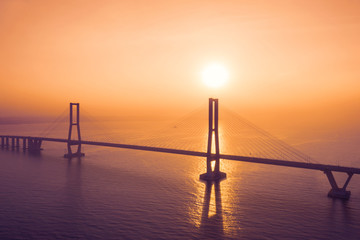 Fototapeta na wymiar Silhouette of Suramadu bridge at sunset