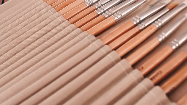 Painting brushes on a table organized