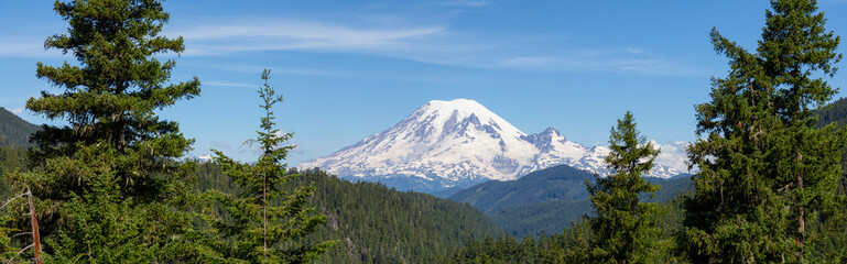 Beautiful Panoramic American Mountain Landscape view during a sunny summer day. Taken in Paradise, Mt Rainier National Park, Washington, United States of America.