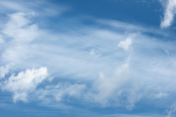 Naklejka na ściany i meble blue sky nature background and white clouds soft focus