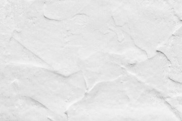 Texture of old white concrete wall background