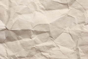 Fototapeta premium Clean brown paper, wrinkled, abstract for background.