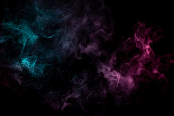 Colored background with winding clouds of smoke from patterns of different forms of pink, green and blue colors with tongues of flame on a black isolated background. Print for t-shirt.