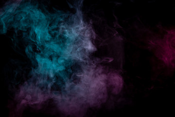 Colored background with winding clouds of smoke from patterns of different forms of pink, green and blue colors with tongues of flame on a black isolated background. Print for t-shirt.