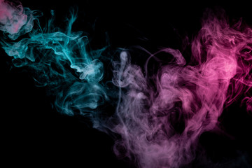 Colored background with winding clouds of smoke from patterns of different forms of pink, green and blue colors with tongues of flame on a black isolated background. Print for t-shirt.