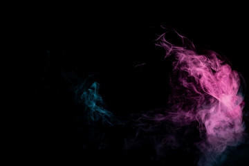 Colored background with winding clouds of smoke from patterns of different forms of pink, green and blue colors with tongues of flame on a black isolated background. Print for t-shirt.