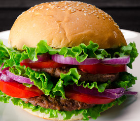 Burger served in bun in nutrition fast food concept