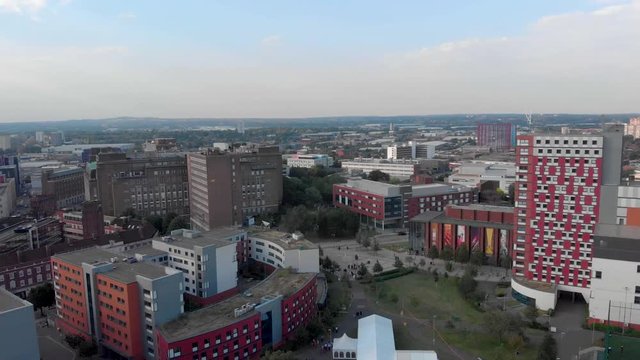 Aston University Birmingham City Campus Aerial Shot of the University Campus Aston Main Building main campus business school and football astro cage sports students living in the UK 4K 23.976 FPS