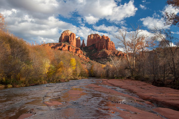 Cathedral Rock from Red Rock Crossing in Sedona, Arizona on a late autumn afternoon under a beautiful cloudscape.