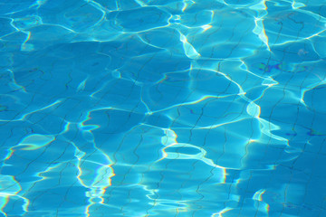 the blue water in the pool close-up. copy space