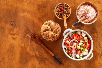 Summer vegetable salad with sunflower seeds and chilli peppers. Diet healthy food. Summer salad with tomato and pepper. Vegetarian food.