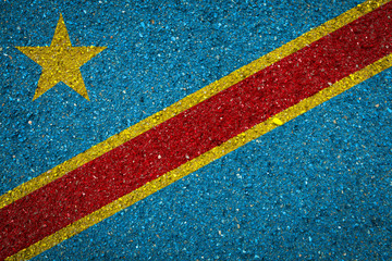 National flag of Democratic Republic of Congo on a stone background.The concept of national pride and symbol of the country.