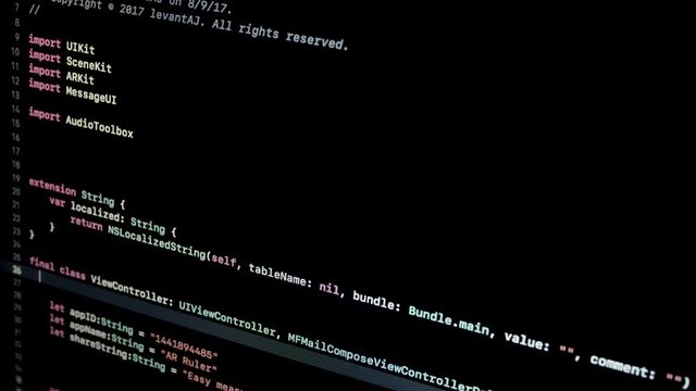 Code 2.11 Scrolling Modern Swift Code By Developer on Notebook screen in Xcode