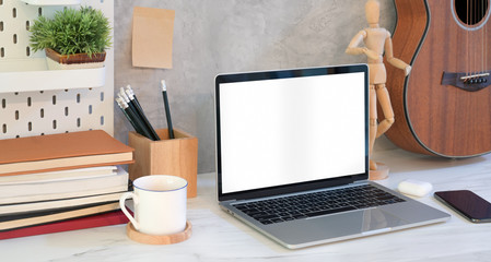 Fototapeta premium Comfortable workplace with open blank screen laptop