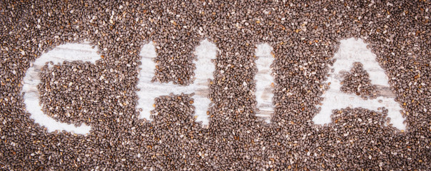 Heap of chia seeds, concept of food containing natural vitamins, fiber and minerals